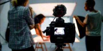 Why is hiring a professional photographer for product photography essential?