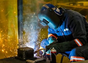 What are the advantages of using robot welders in car manufacturing?
